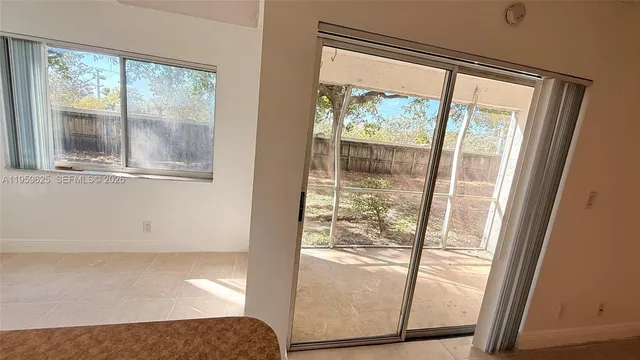 a bathroom with a sink a mirror and shower