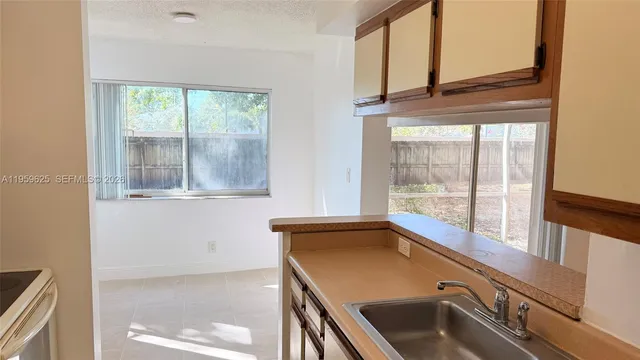 a view of kitchen and hallway