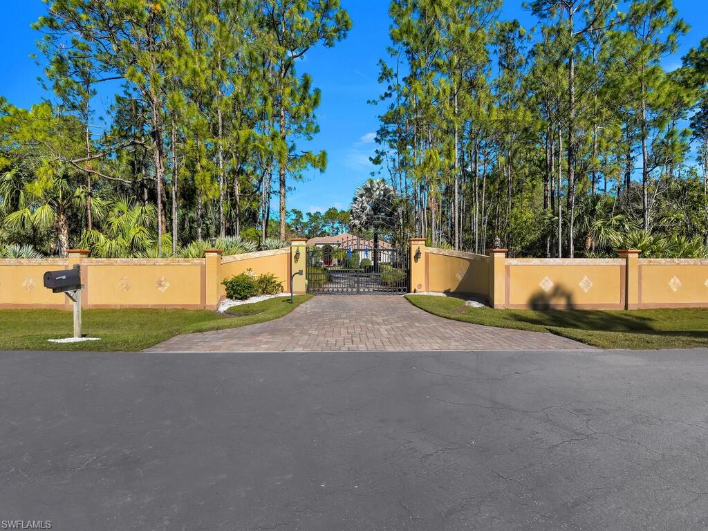 3321 5th Avenue Southwest Naples, FL 34117 - Photo 47 of 50 Remote Entry Gates with Privacy Wall