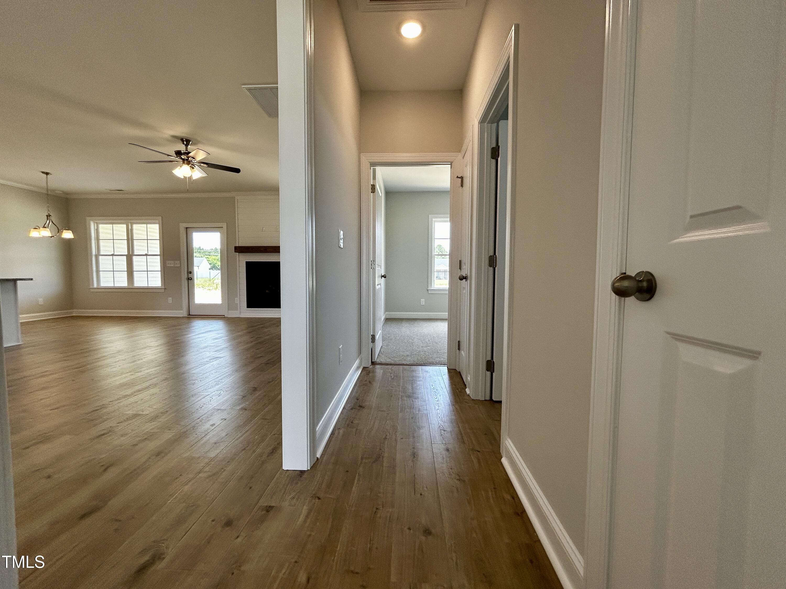 3912 Origin Drive Bailey, NC 27807 - Photo 16 of 20 a view of a hallway with wooden floor