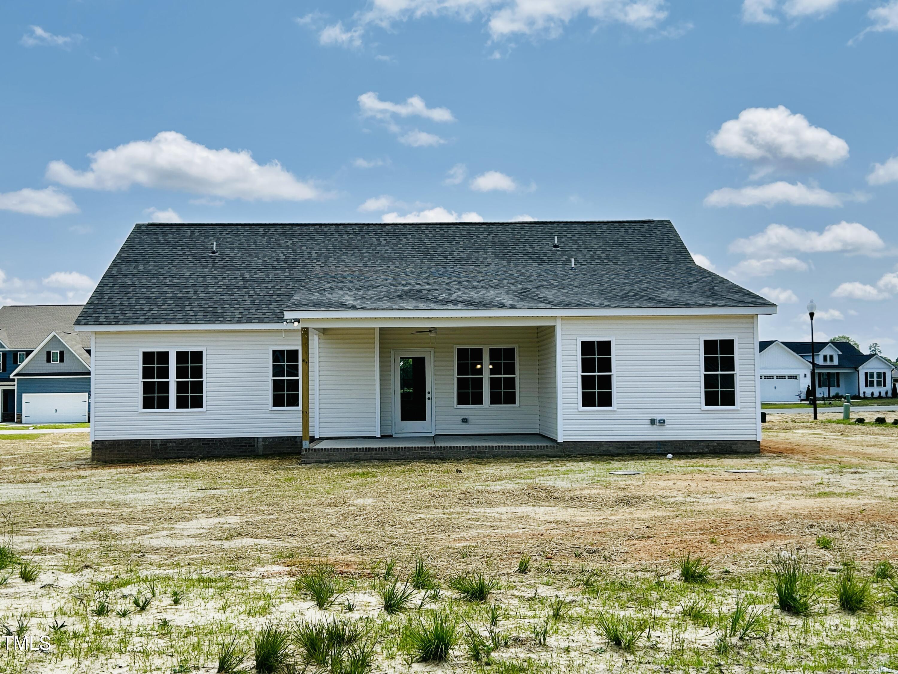 3912 Origin Drive Bailey, NC 27807 - Photo 20 of 20 a house with yard in front of it
