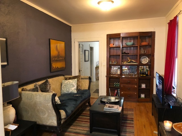 3059 West Lyndale Street Chicago, IL 60647 - Photo 3 of 10 a living room with furniture and a wooden floor