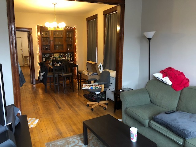 3059 West Lyndale Street Chicago, IL 60647 - Photo 8 of 10 a living room with furniture and a chandelier