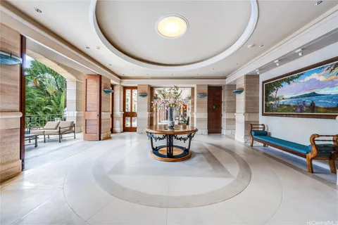 a view of a patio with a table chairs and a backyard