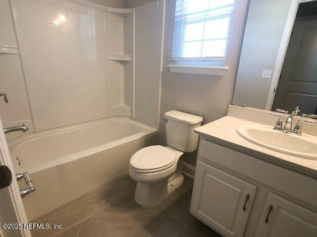 13991 Molina Drive Jacksonville, FL 32256 - Photo 16 of 34 a bathroom with a sink toilet and shower