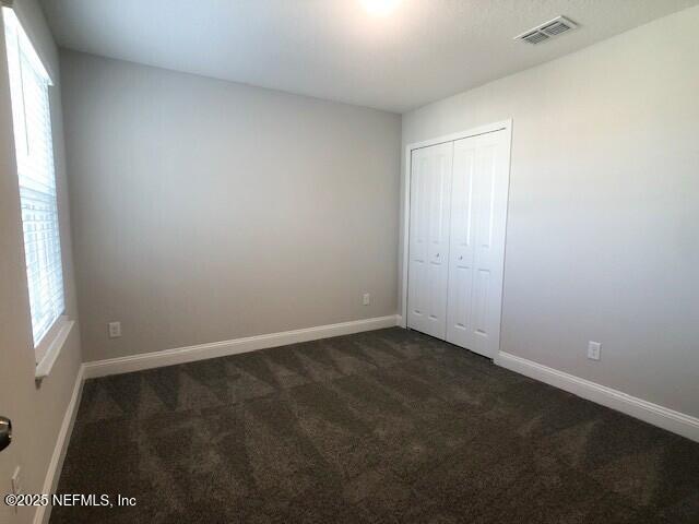 13991 Molina Drive Jacksonville, FL 32256 - Photo 17 of 34 an empty room with a window