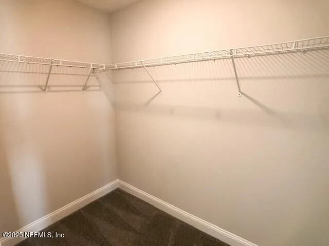 a view of backyard with green space