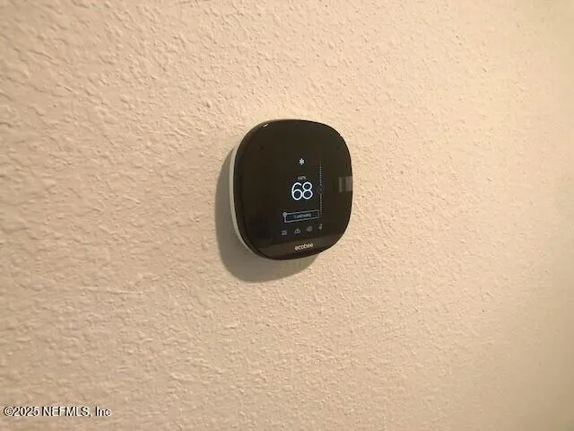 a view of room with racks on the wall