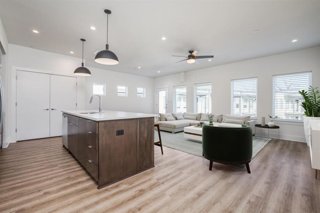408 Martin Luther King Junior Boulevard, Unit 401 Waxahachie, TX 75165 - Photo 8 of 15 a spacious bathroom with a double vanity sink a mirror and a bathtub