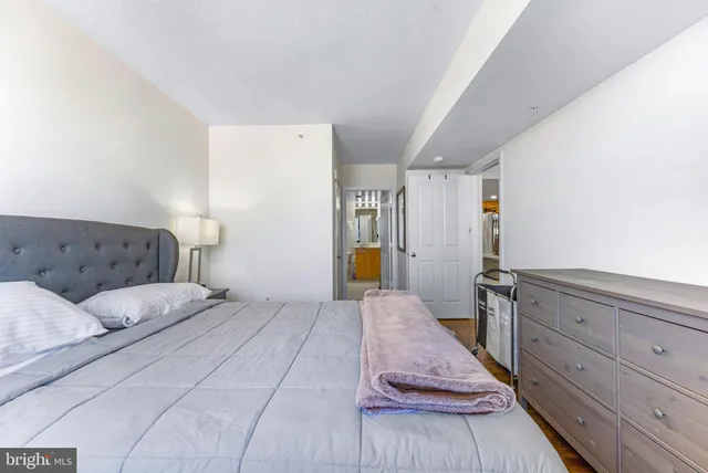 a bed room with a bed and a couch