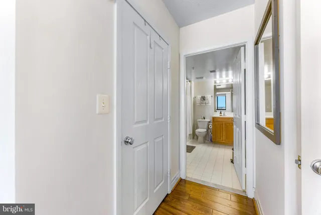 a view of a bathroom with a tub and shower