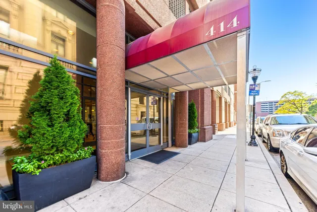 a view of a balcony with furniture