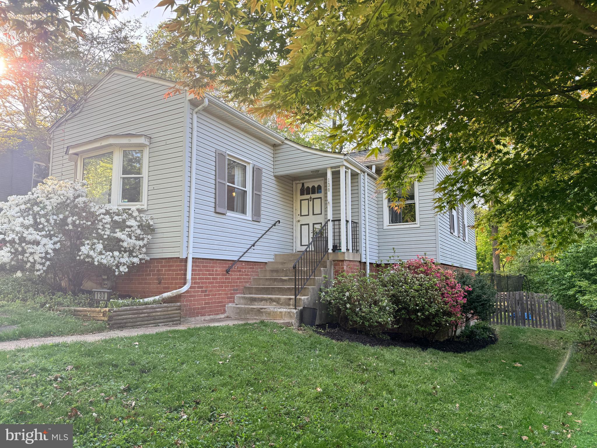 a view of a back yard of the house