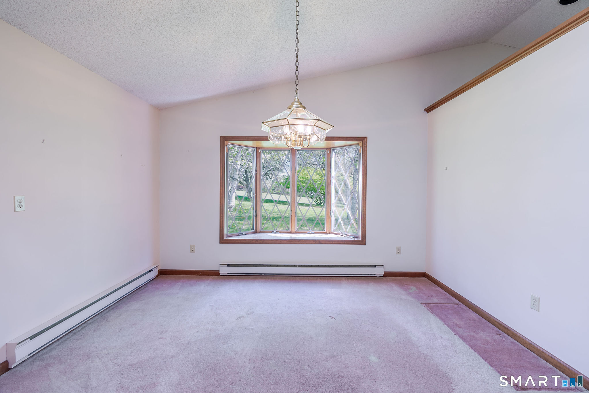 123 Mine Hill Road New Milford, CT 06776 - Photo 11 of 36 en empty room with windows and outdoor view