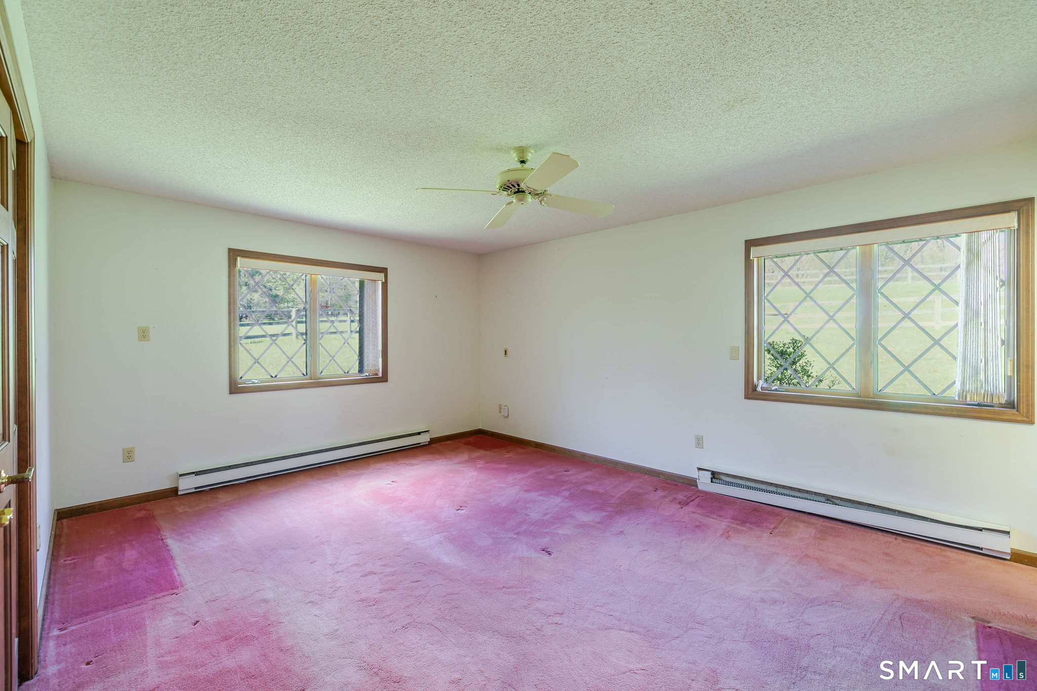 123 Mine Hill Road New Milford, CT 06776 - Photo 17 of 36 an empty room with windows and closet