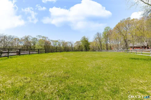 a view of a house with a big yard