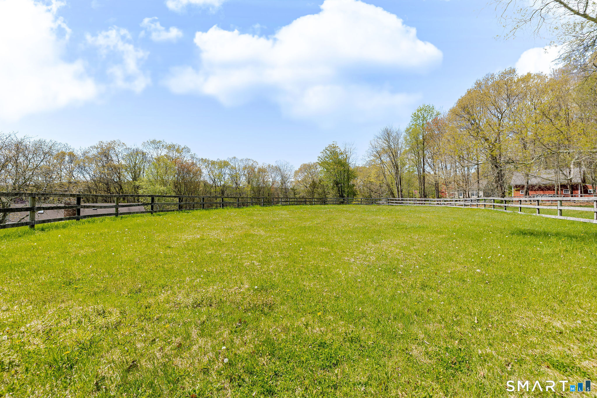 123 Mine Hill Road New Milford, CT 06776 - Photo 29 of 36 a view of a field with trees in the background