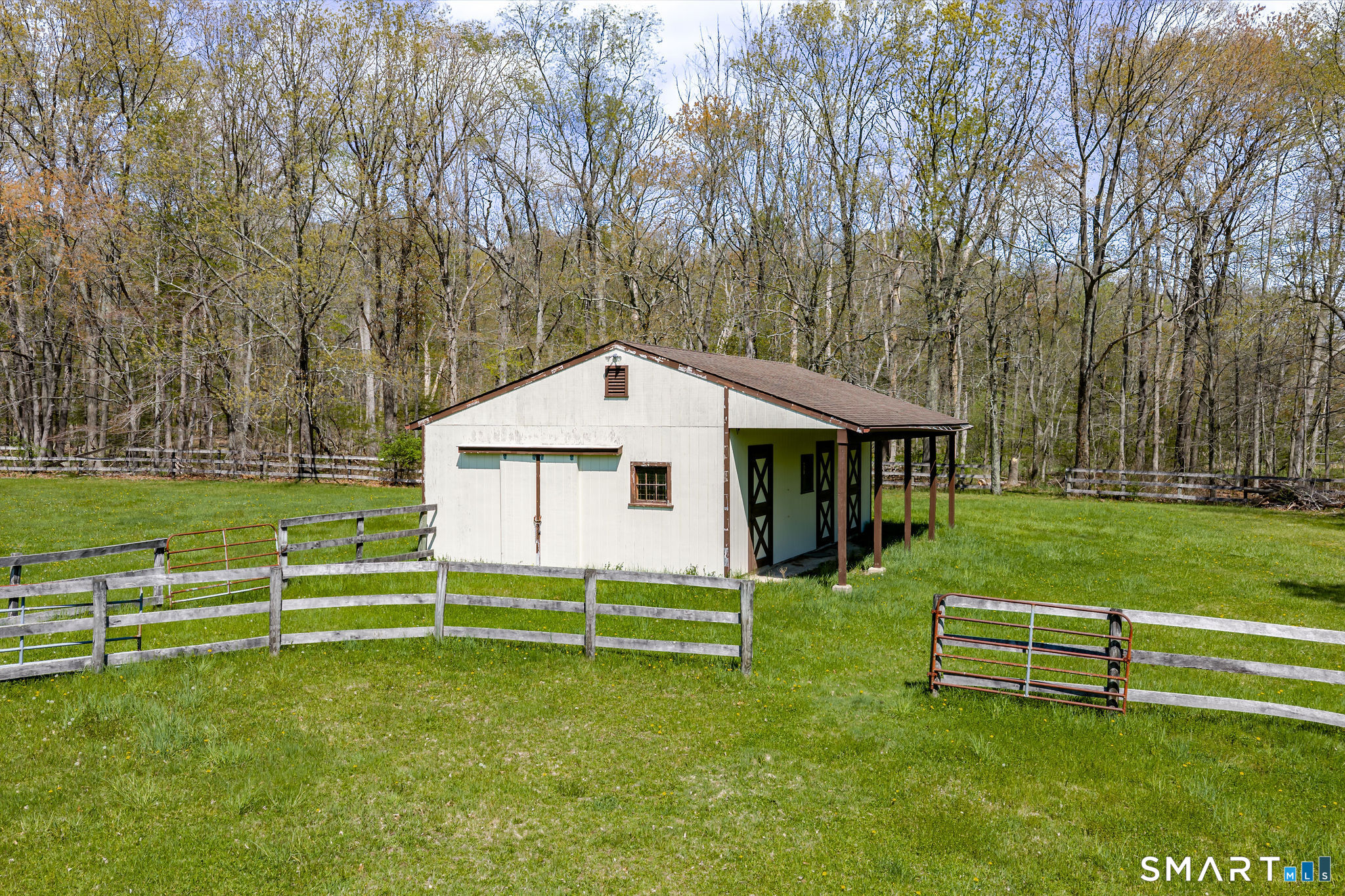 123 Mine Hill Road New Milford, CT 06776 - Photo 33 of 36 a view of a house with a backyard