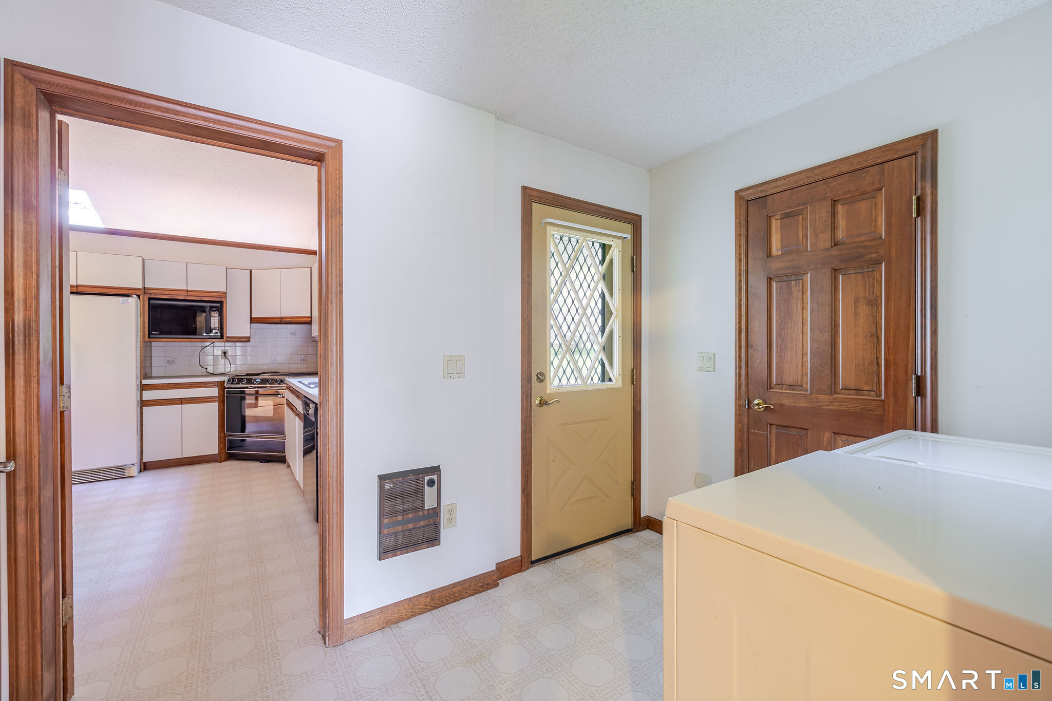 123 Mine Hill Road New Milford, CT 06776 - Photo 6 of 36 a bedroom with a bed and a view of en suite bathroom