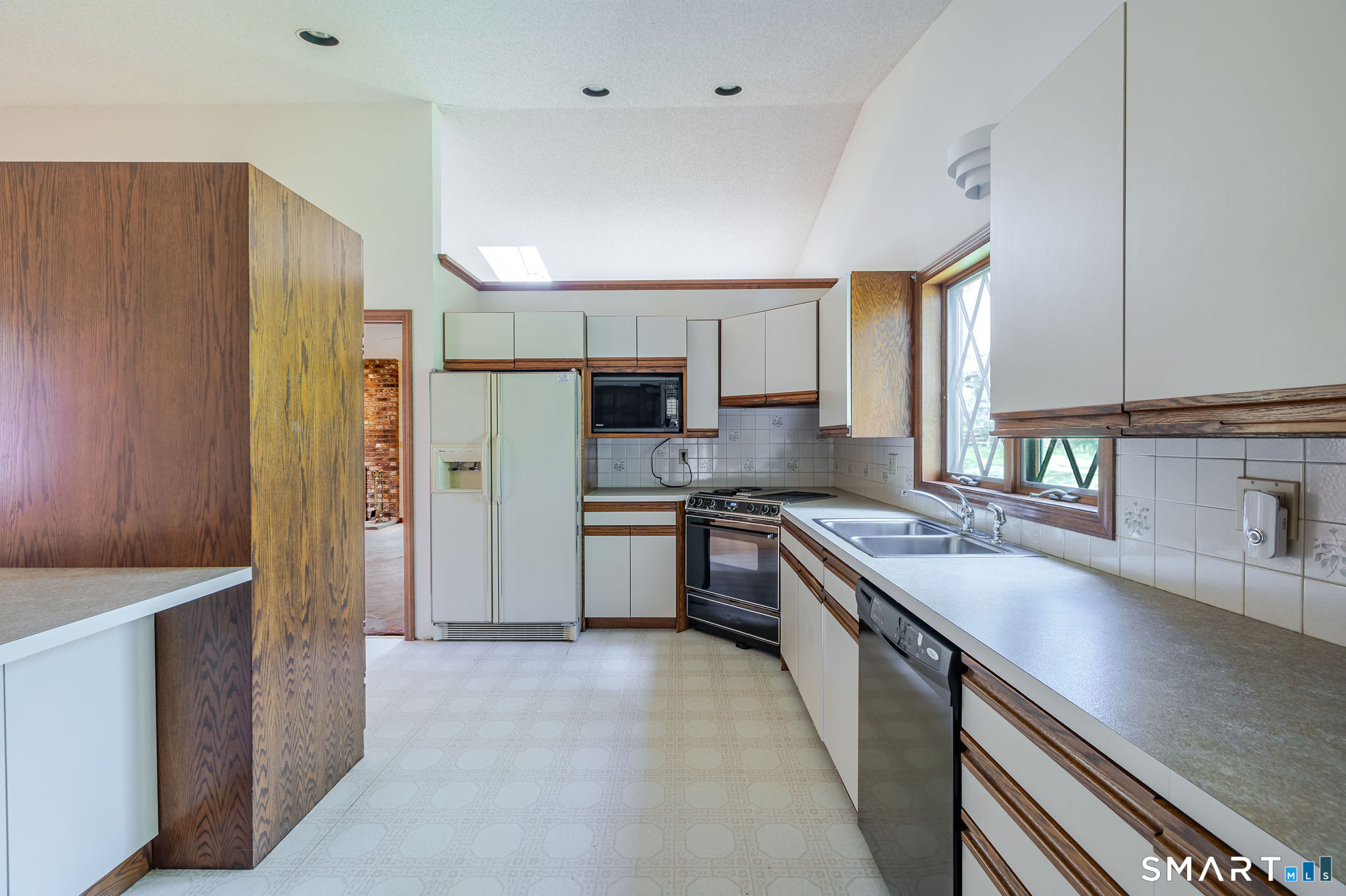 123 Mine Hill Road New Milford, CT 06776 - Photo 7 of 36 a kitchen with stainless steel appliances granite countertop a refrigerator a sink dishwasher stove and oven