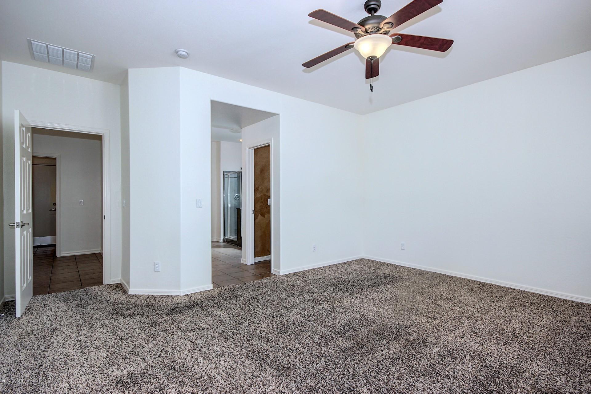 15251 West Boca Raton Road Surprise, AZ 85379 - Photo 21 of 39 15251 Boca Raton-Master Bedroom (4)