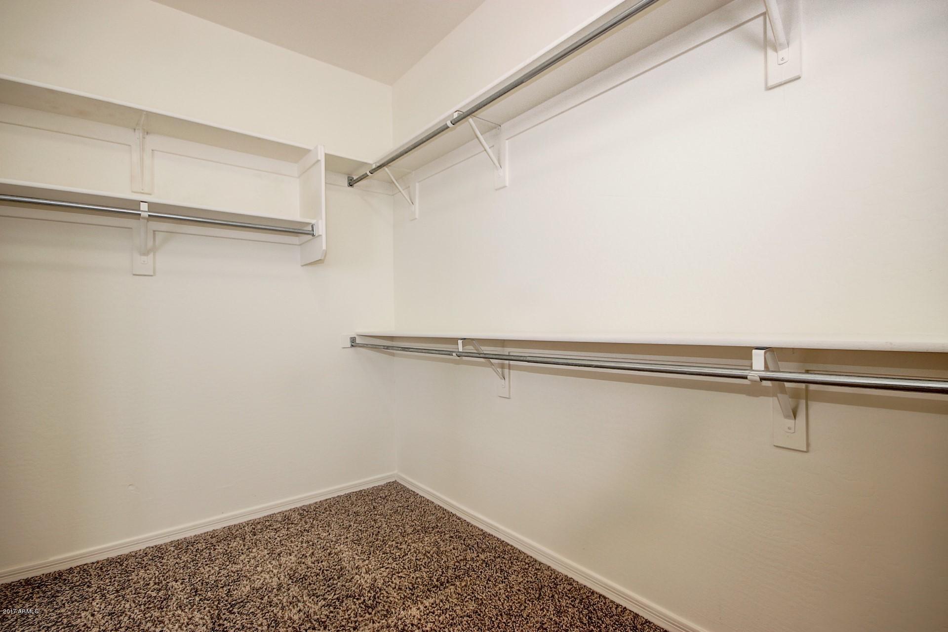 15251 West Boca Raton Road Surprise, AZ 85379 - Photo 22 of 39 15251 Boca Raton-Master Bedrm Closet