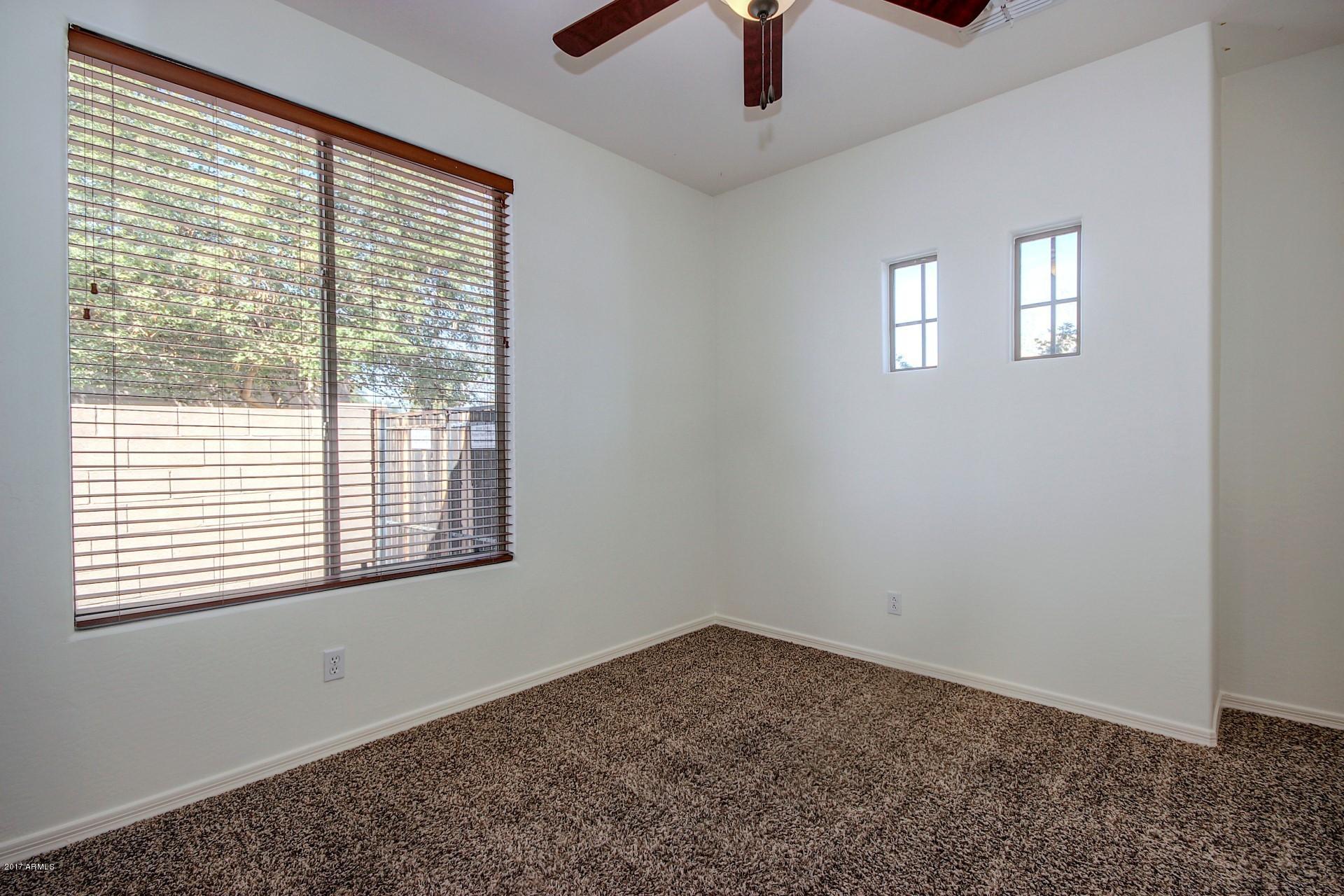 15251 West Boca Raton Road Surprise, AZ 85379 - Photo 28 of 39 15251 Boca Raton-Bedroom 3 (2)
