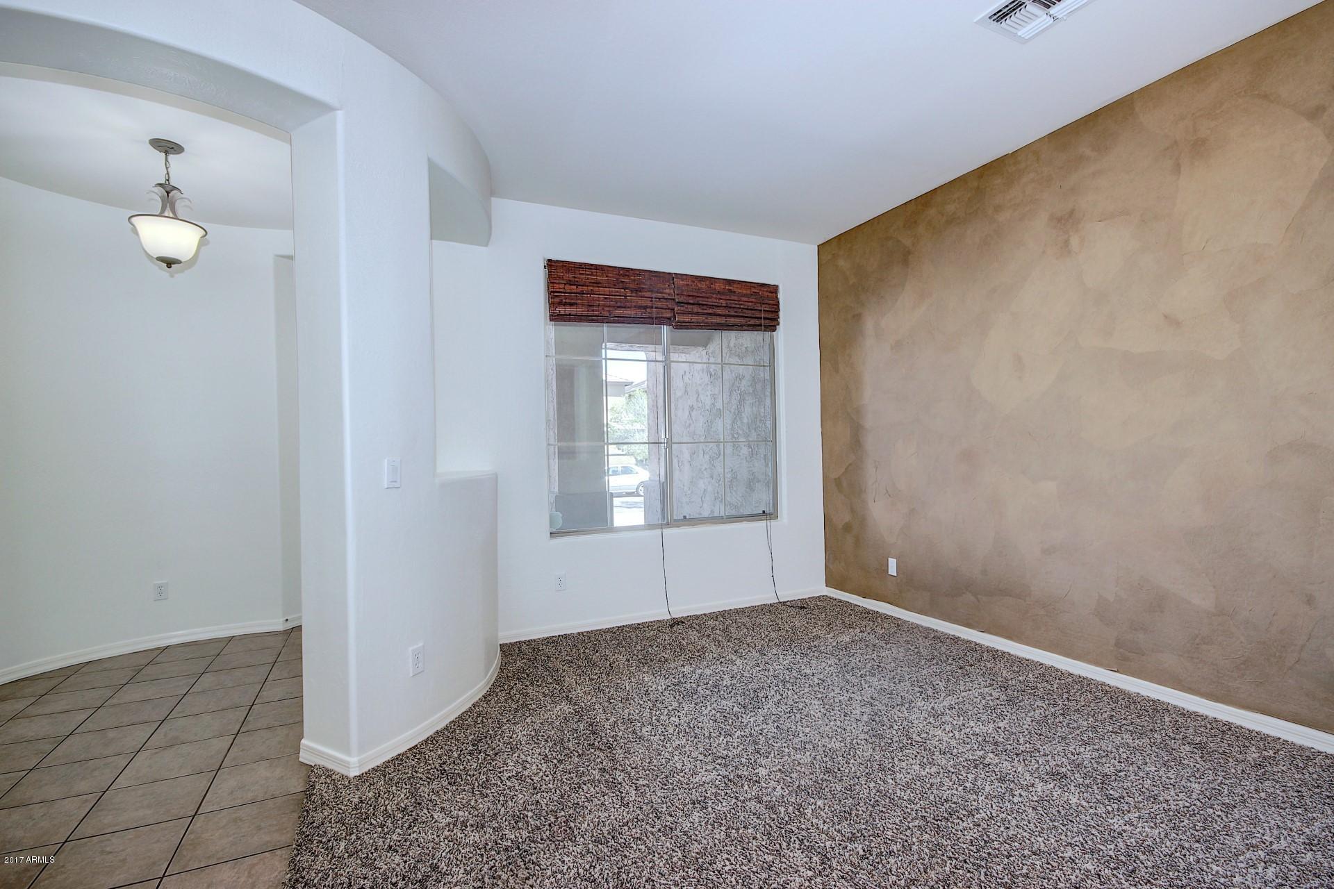 15251 West Boca Raton Road Surprise, AZ 85379 - Photo 4 of 39 15251 Boca Raton-Front Room & Foyer