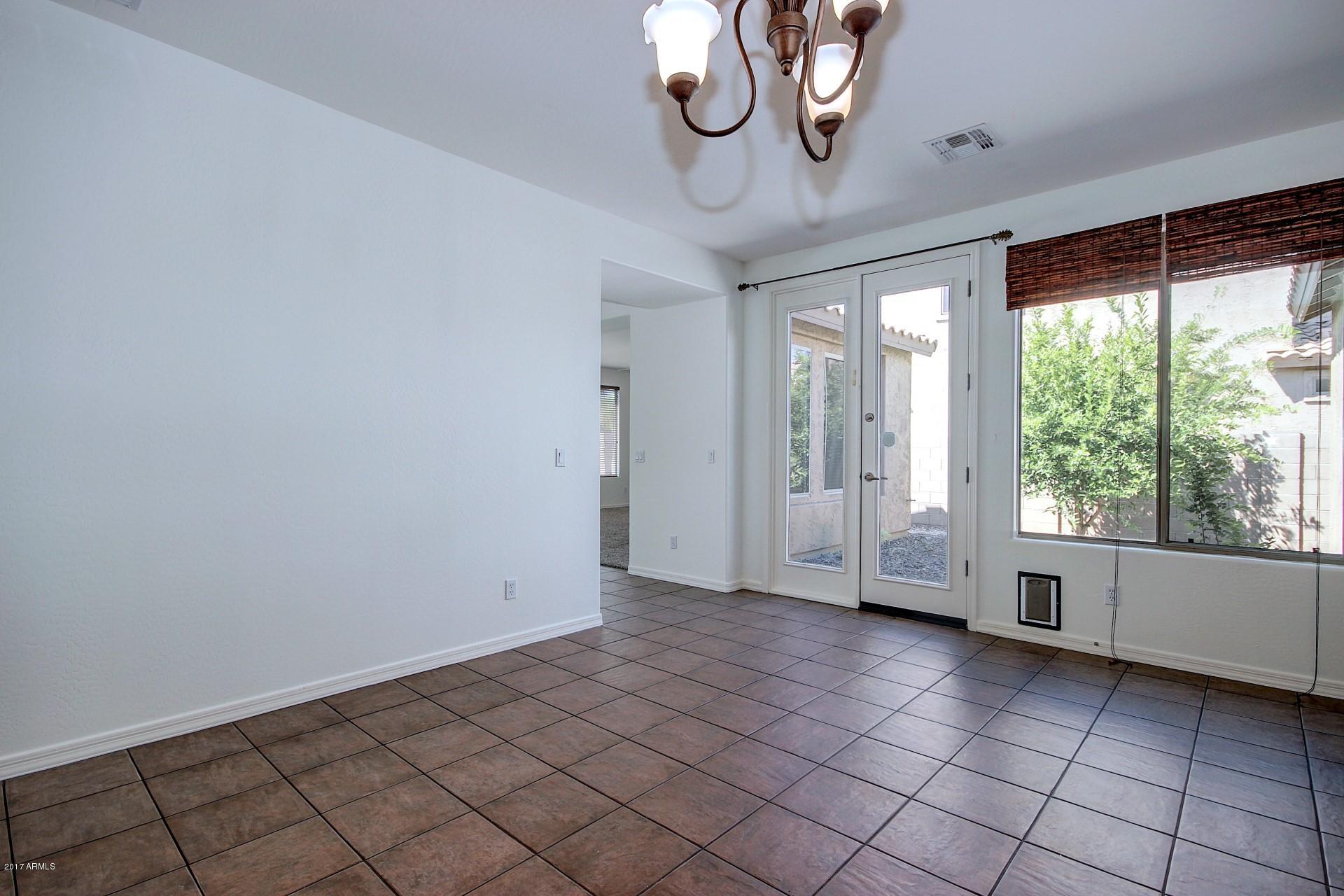15251 West Boca Raton Road Surprise, AZ 85379 - Photo 7 of 39 15251 Boca Raton-Extra Patio across from