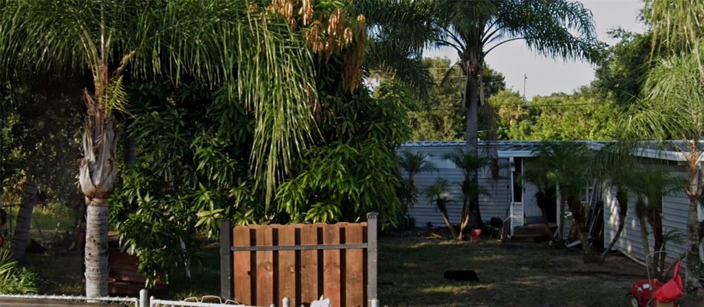 6958 Aster Drive Cocoa, FL 32927 - Photo 1 of 1 a view of a backyard