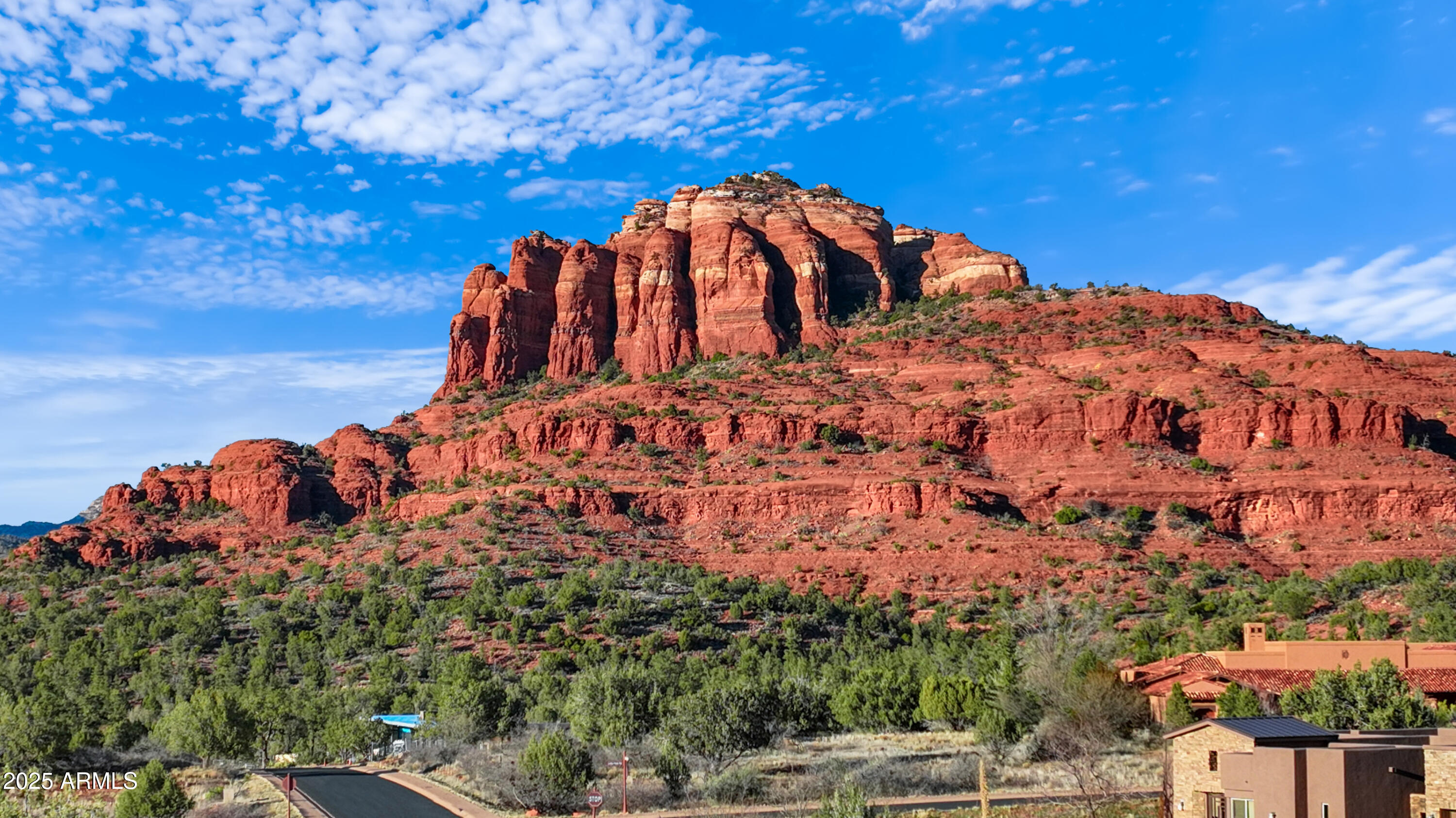 10 Cathedral Ranch Drive, Unit 3 Sedona, AZ 86351 - Photo 1 of 19 a view of a large building with a yard