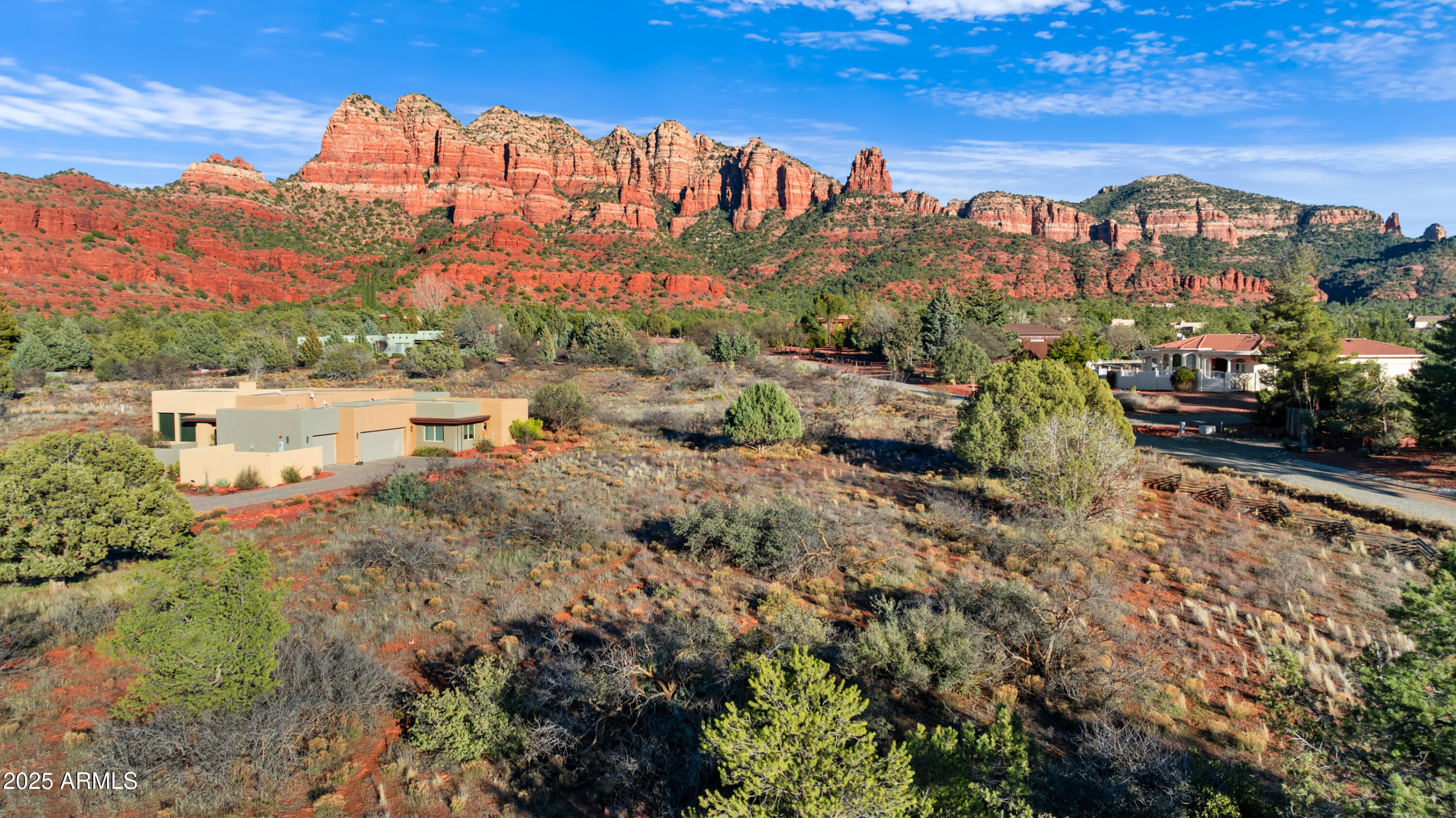 10 Cathedral Ranch Drive, Unit 3 Sedona, AZ 86351 - Photo 12 of 19 a view of a lake with a building in the background