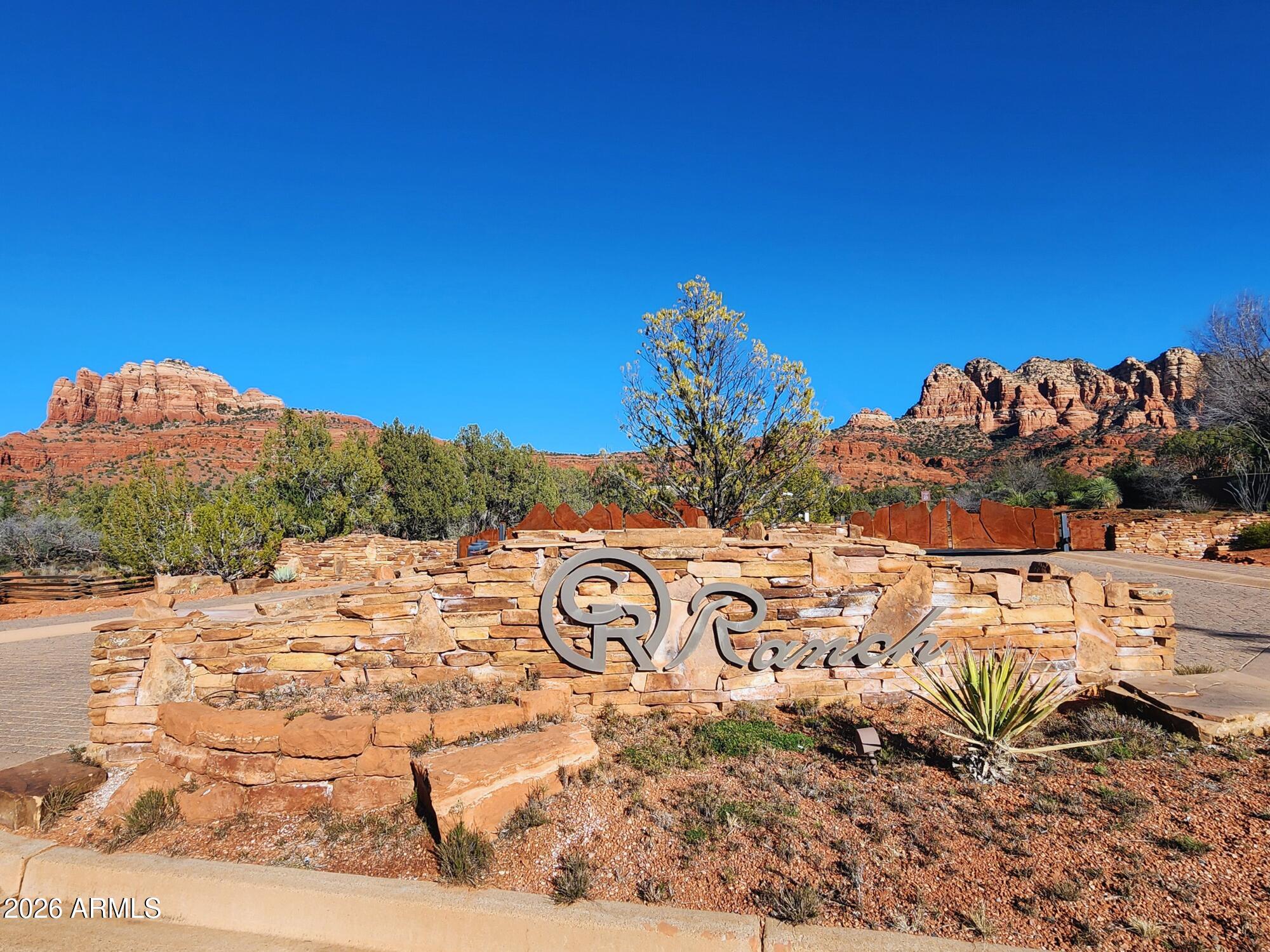 10 Cathedral Ranch Drive, Unit 3 Sedona, AZ 86351 - Photo 15 of 19 a view of a dry yard with trees