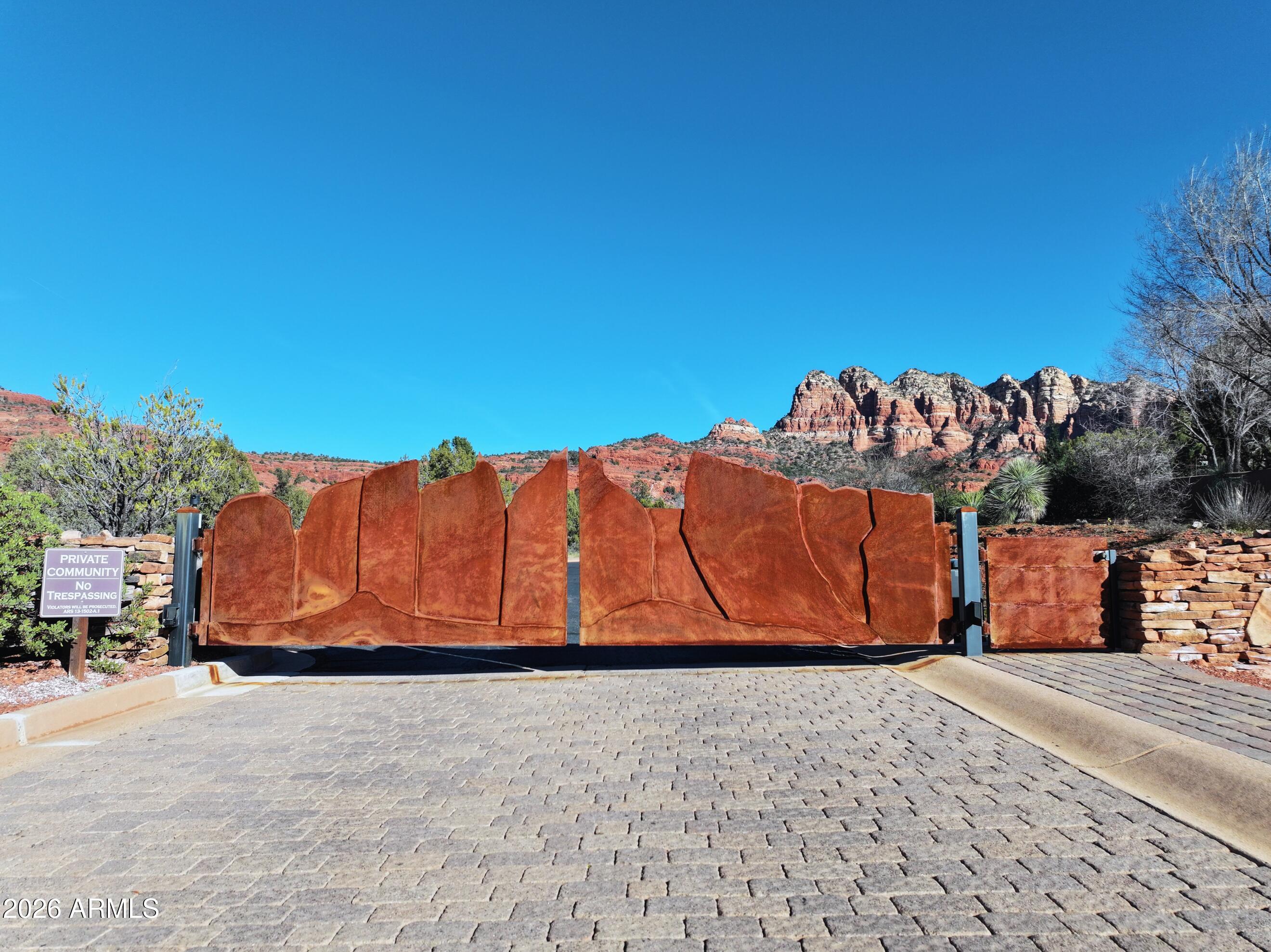 10 Cathedral Ranch Drive, Unit 3 Sedona, AZ 86351 - Photo 17 of 19 a view of a road with a building in the background