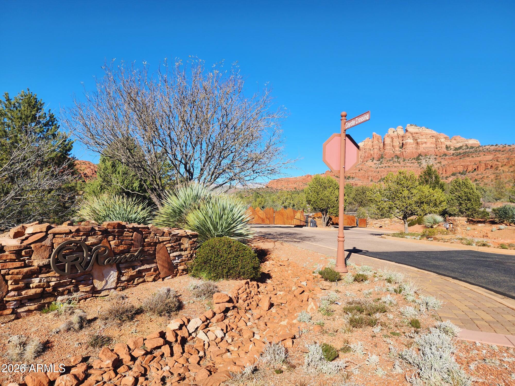 10 Cathedral Ranch Drive, Unit 3 Sedona, AZ 86351 - Photo 18 of 19 a view of a road with a yard