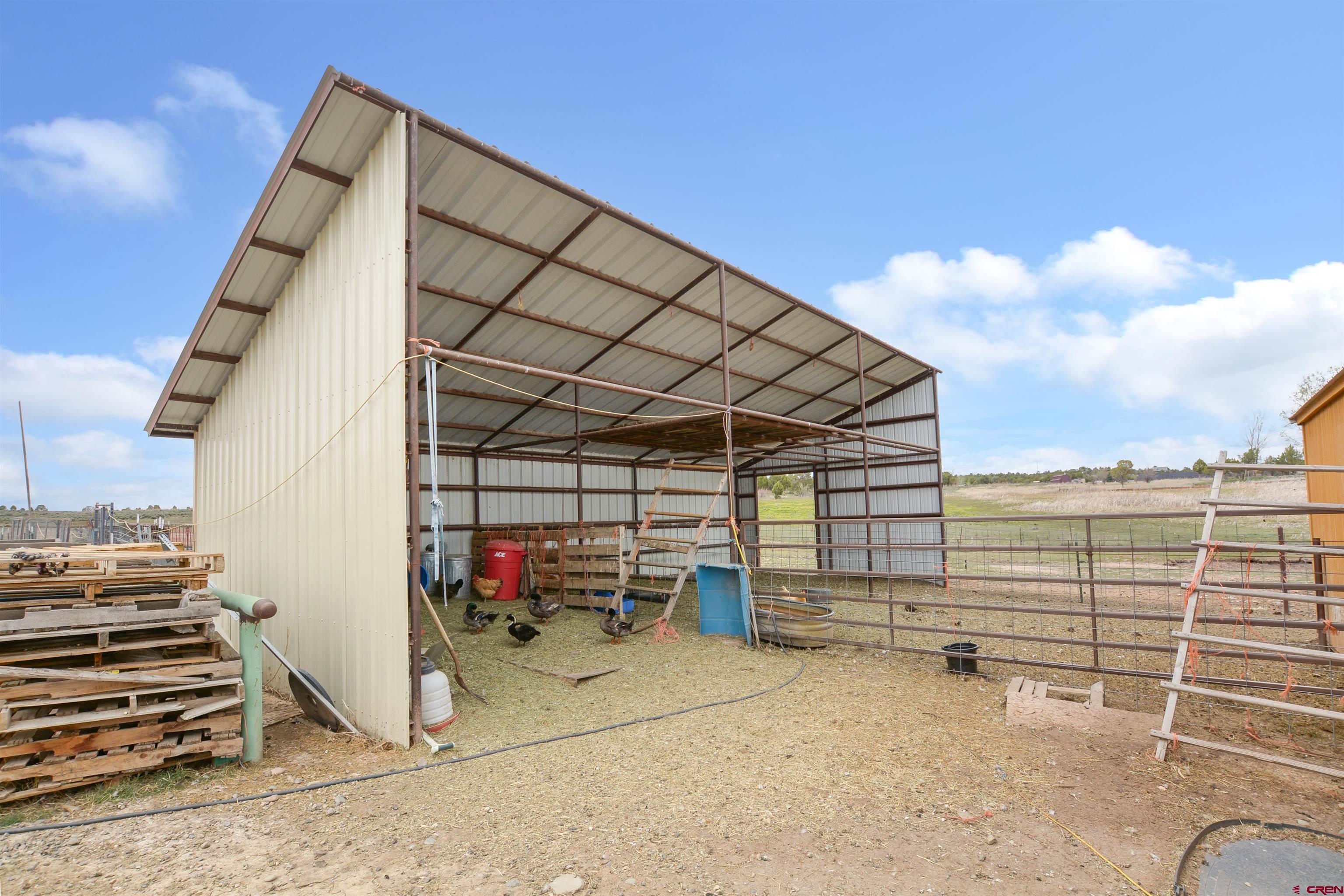 3519 County Road 311 Ignacio, CO 81137 - Photo 18 of 22 a view of a balcony with wooden floor and seating space
