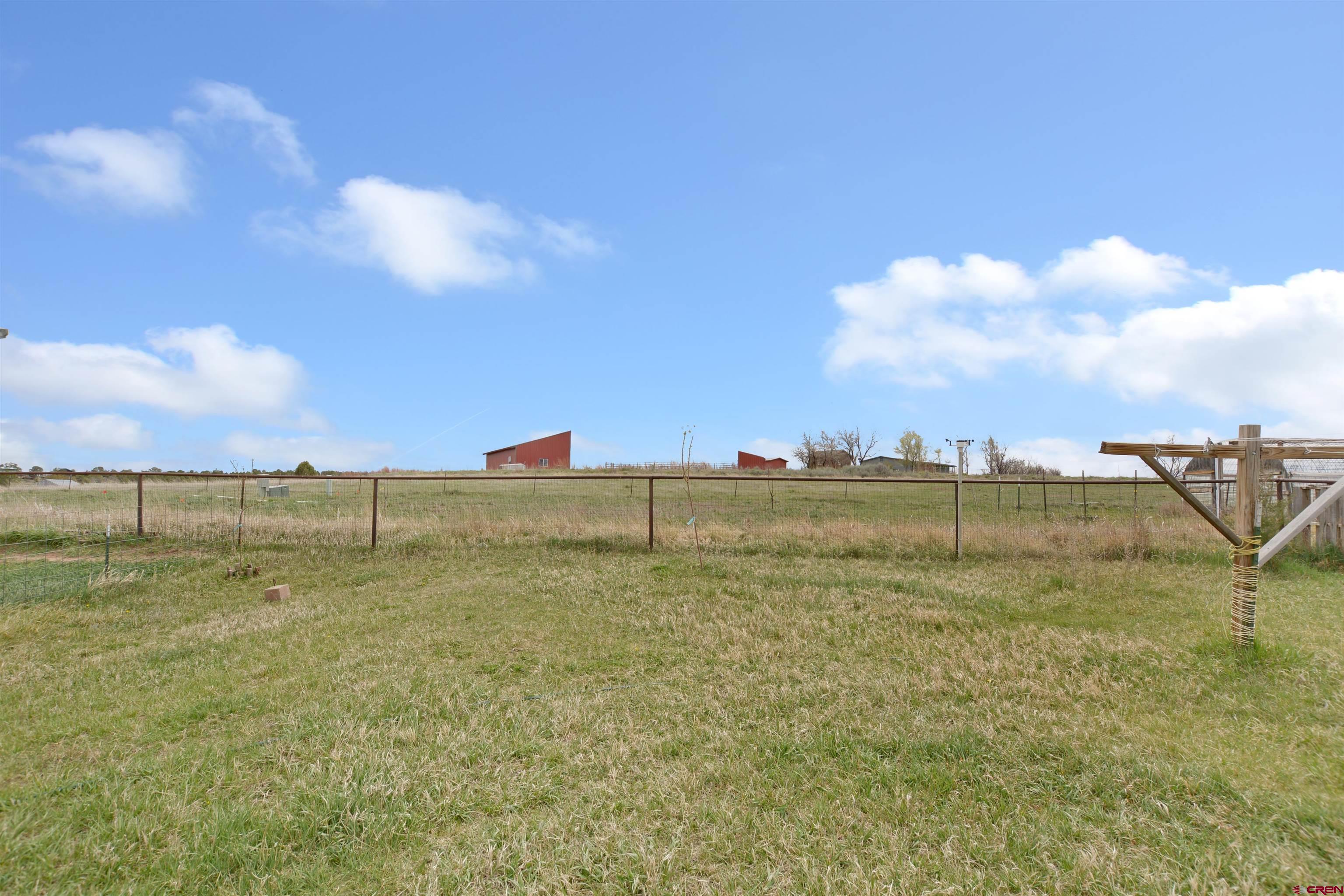 3519 County Road 311 Ignacio, CO 81137 - Photo 20 of 22 a view of a lake and a yard