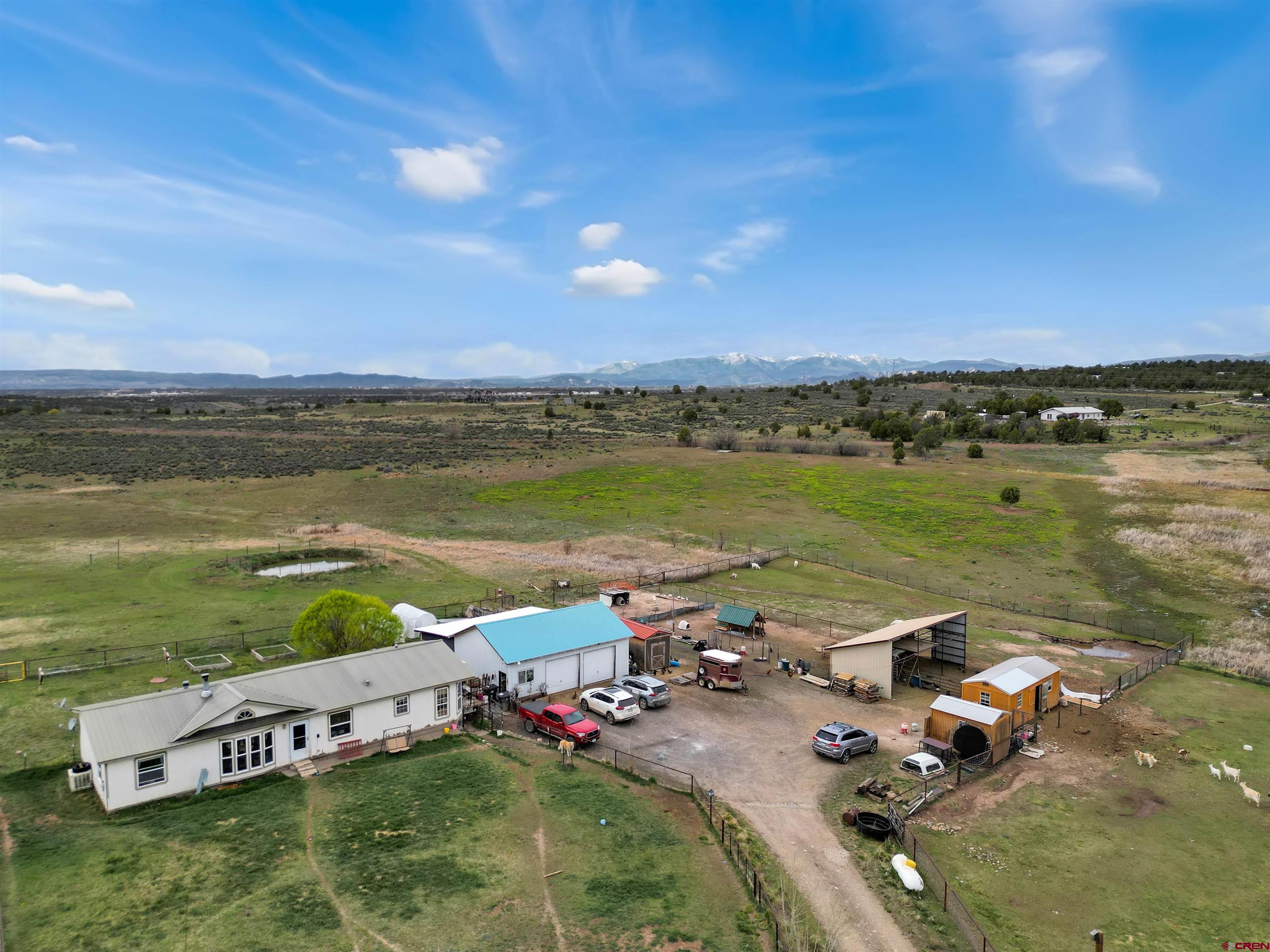 3519 County Road 311 Ignacio, CO 81137 - Photo 3 of 22 an aerial view of a city with lots of residential buildings and ocean view