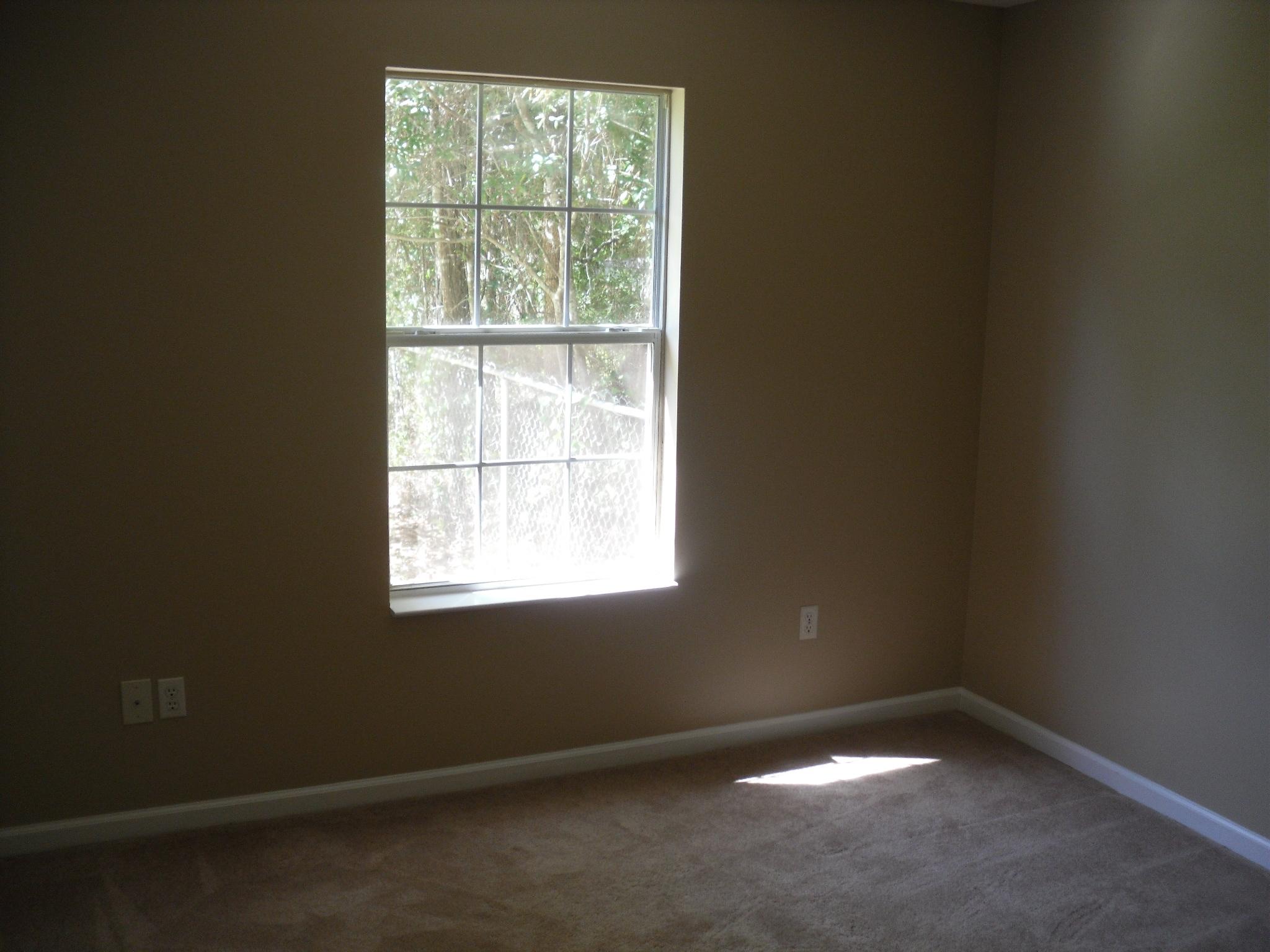 703 Bay Grove Road Freeport, FL 32439 - Photo 13 of 22 an empty room with a window