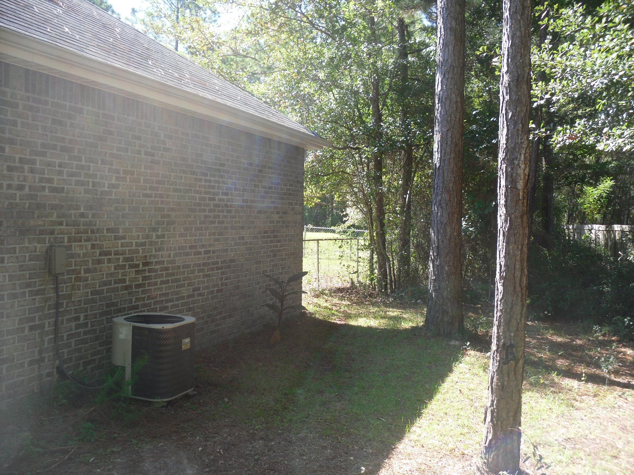 703 Bay Grove Road Freeport, FL 32439 - Photo 18 of 22 a view of a small yard