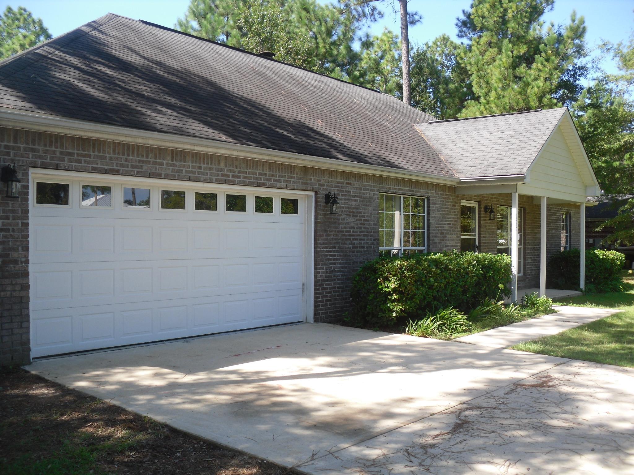 703 Bay Grove Road Freeport, FL 32439 - Photo 22 of 22 a backyard of a house