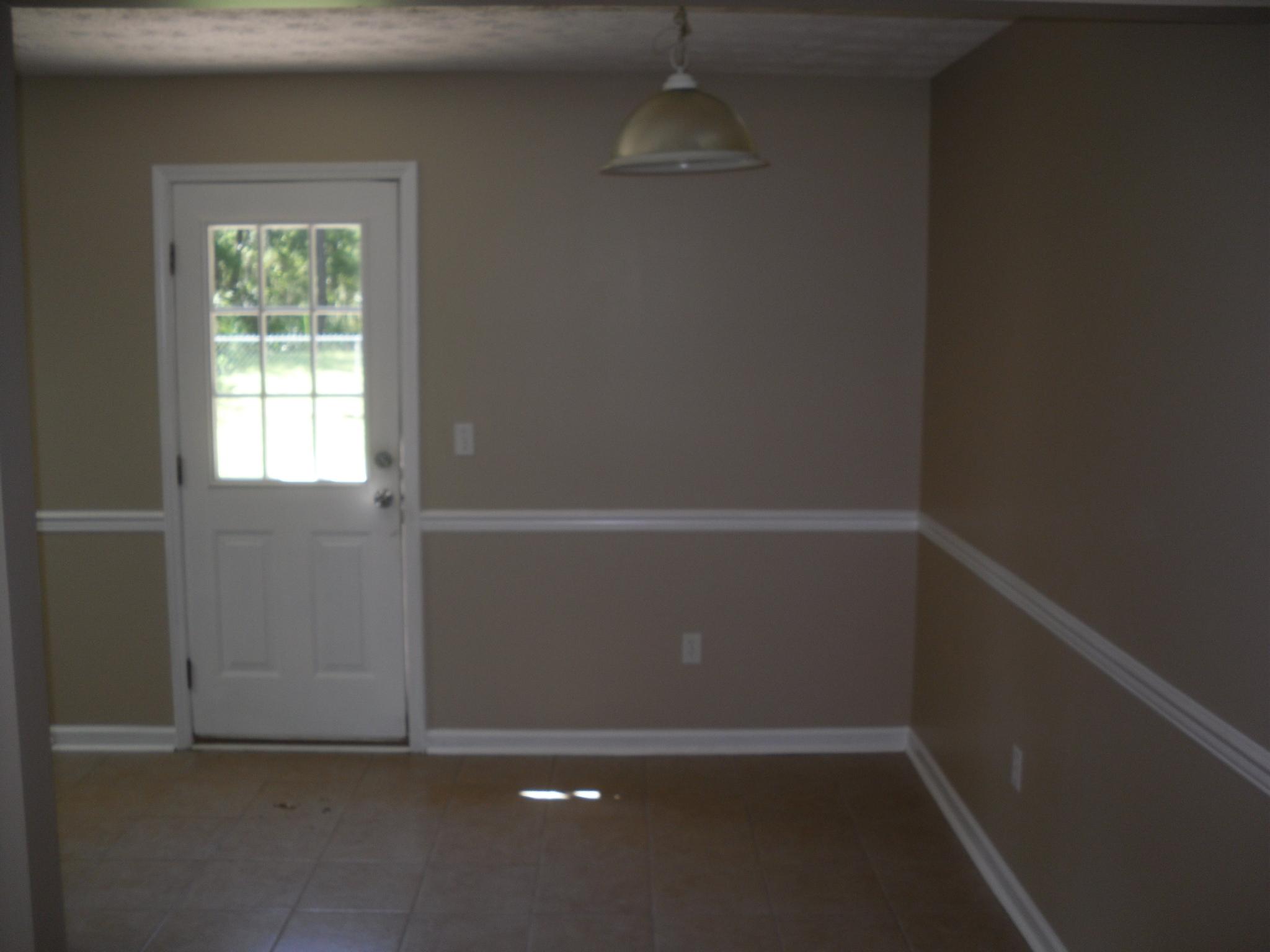 703 Bay Grove Road Freeport, FL 32439 - Photo 5 of 22 an empty room with a window