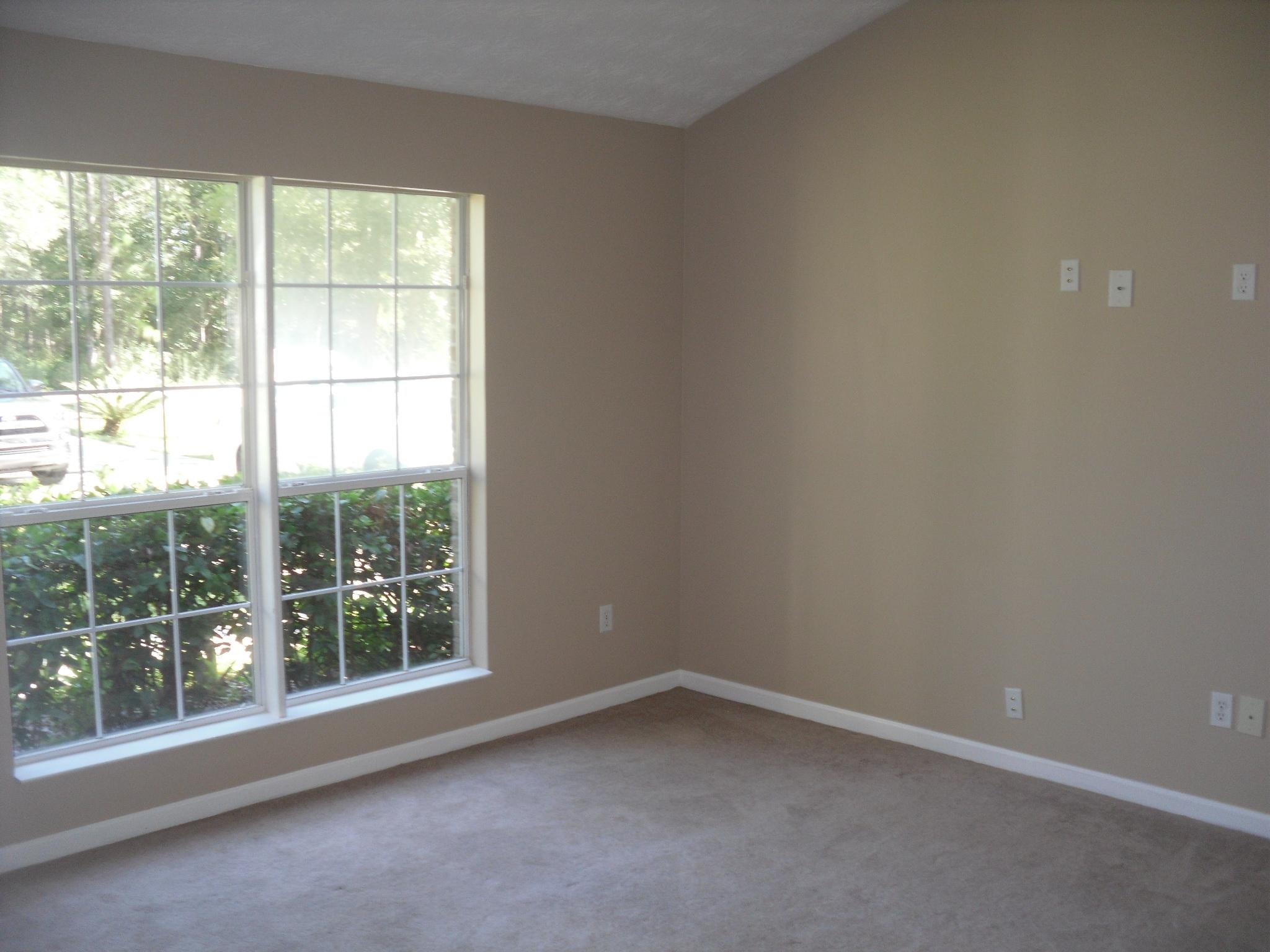 703 Bay Grove Road Freeport, FL 32439 - Photo 10 of 22 an empty room with a window