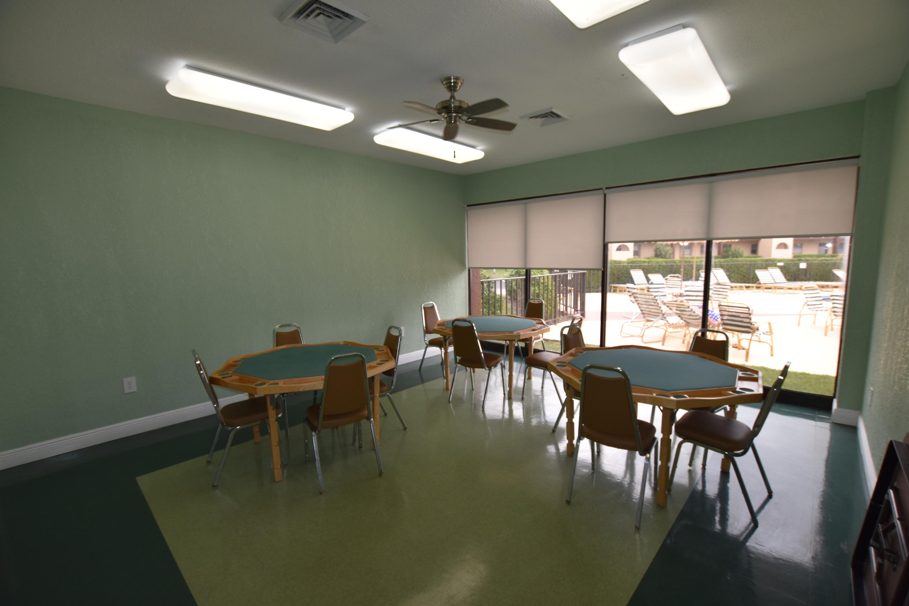 2780 North Pine Island Road, Unit 312 Sunrise, FL 33322 - Photo 20 of 30 a view of a dining room with furniture window and outside view