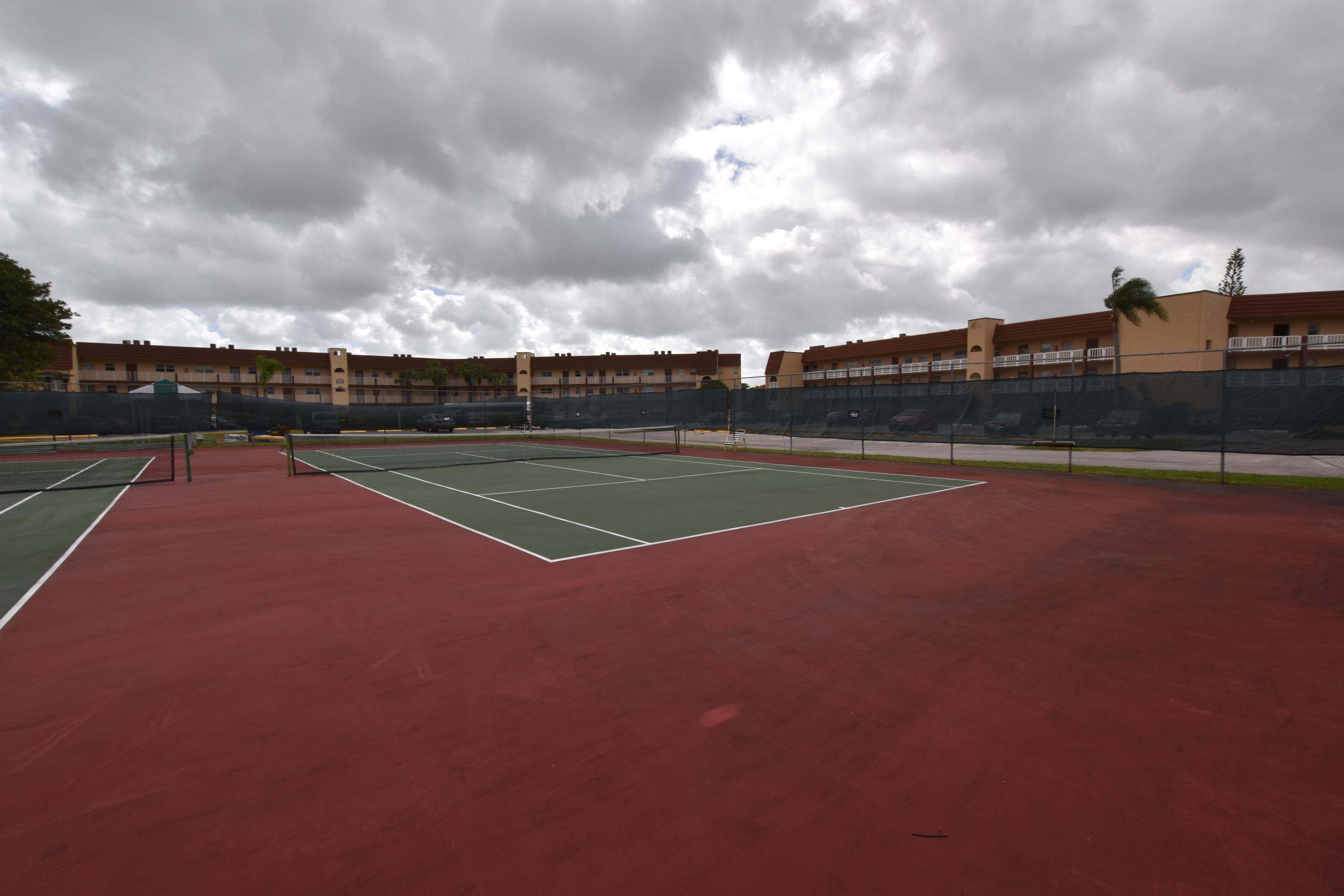 2780 North Pine Island Road, Unit 312 Sunrise, FL 33322 - Photo 21 of 30 a view of a tennis court