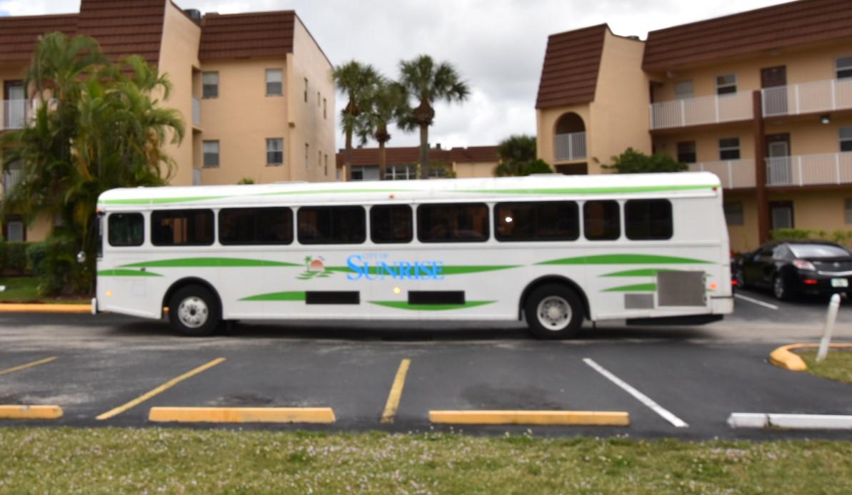 2780 North Pine Island Road, Unit 312 Sunrise, FL 33322 - Photo 22 of 30 a view of a car parked in front of a building