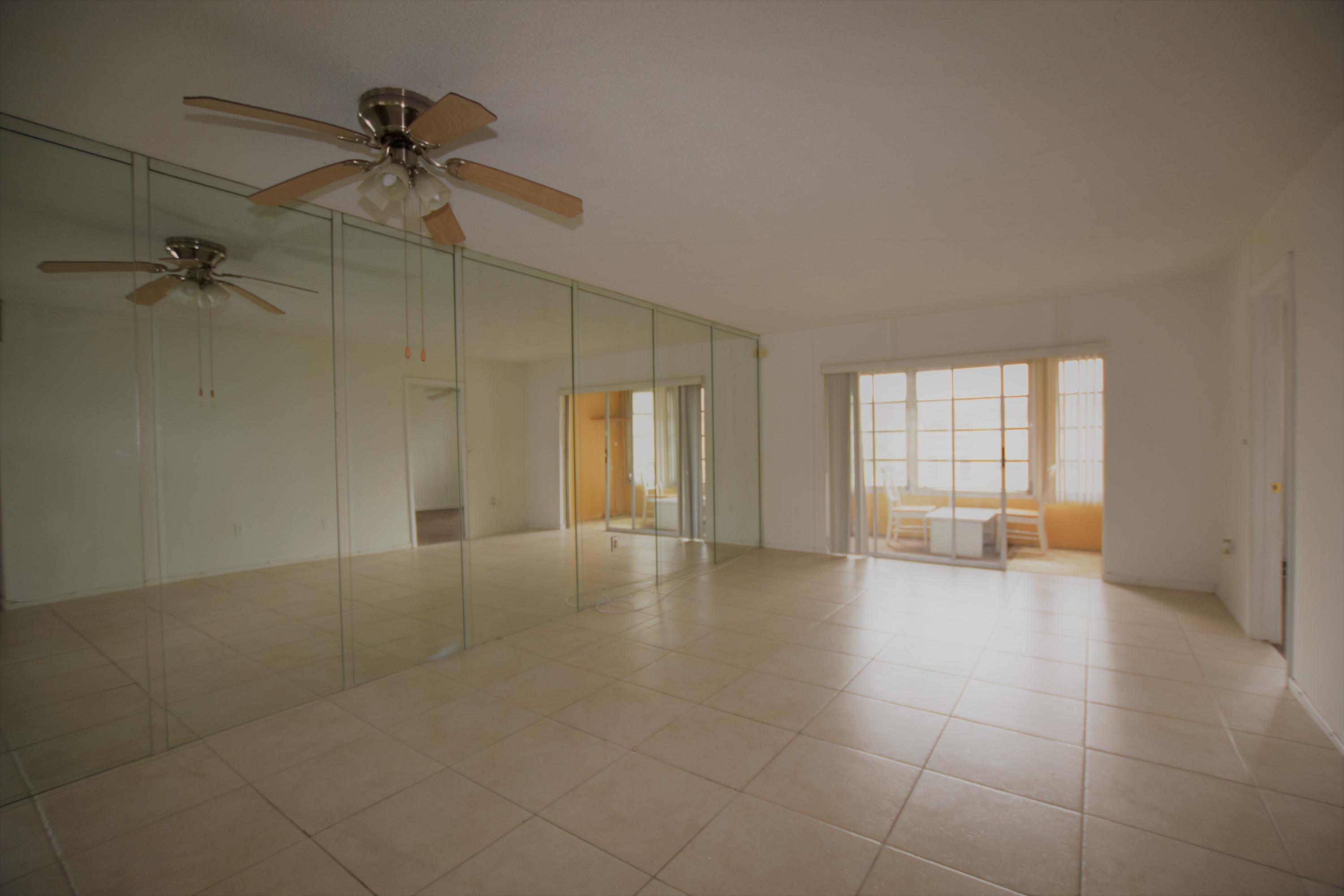 2780 North Pine Island Road, Unit 312 Sunrise, FL 33322 - Photo 4 of 30 a view of an empty room with a window