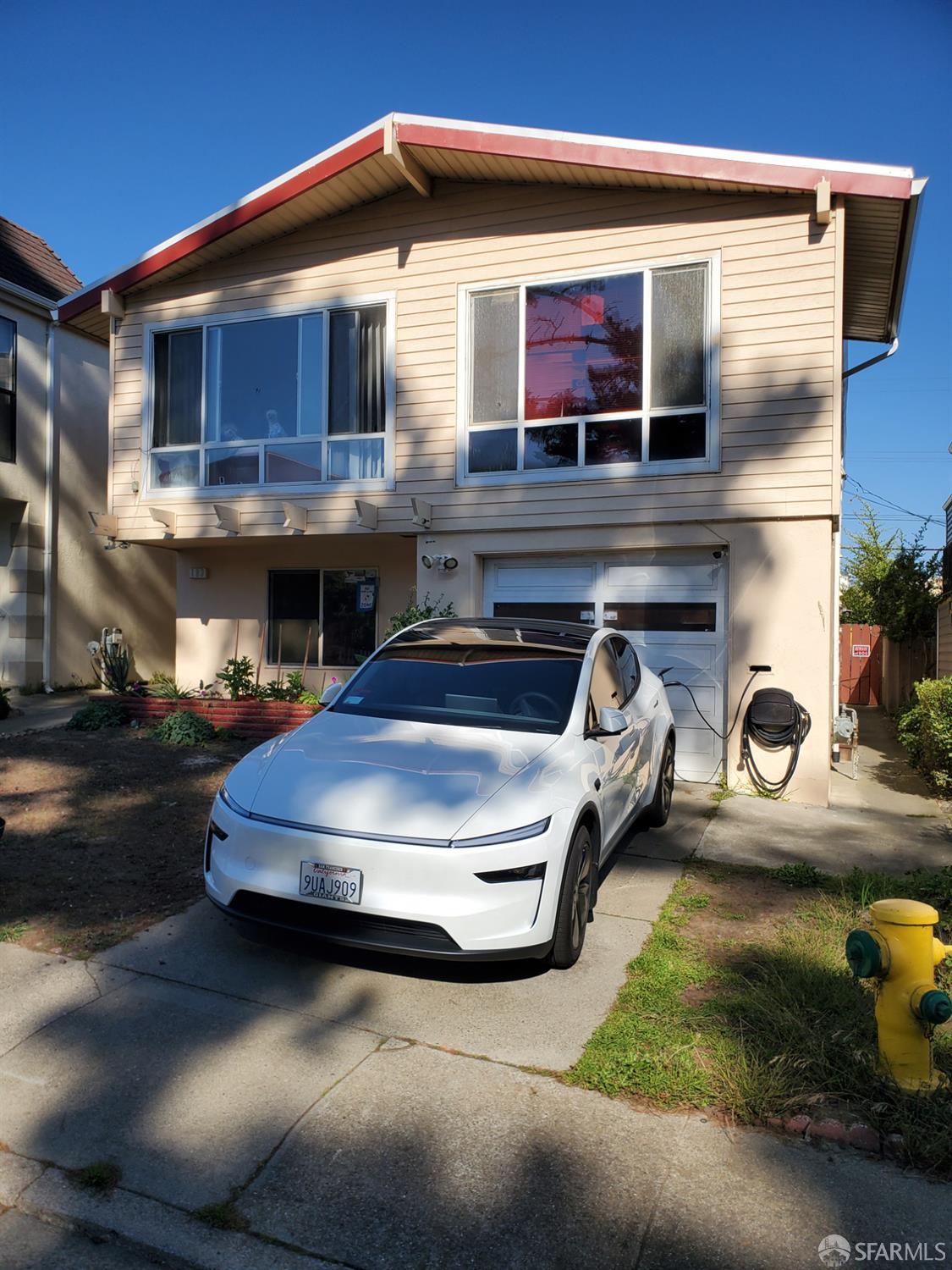 183 Mariposa Avenue Daly City, CA 94015 - Photo 1 of 27 a car parked in front of garage
