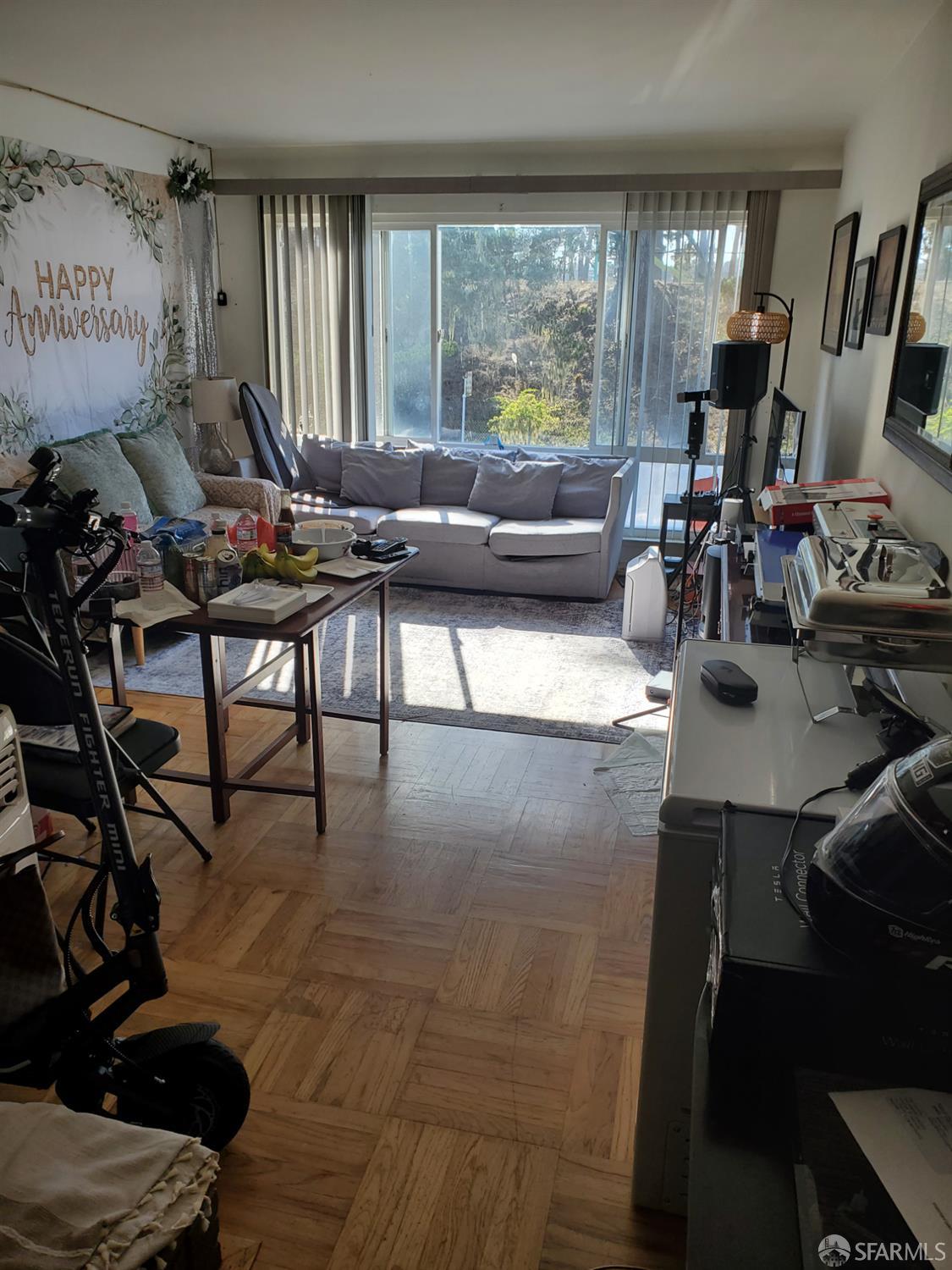 183 Mariposa Avenue Daly City, CA 94015 - Photo 13 of 27 a living room with furniture and a large window