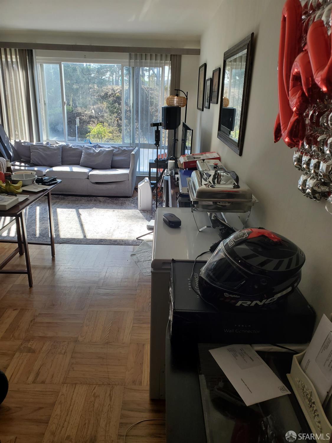 183 Mariposa Avenue Daly City, CA 94015 - Photo 14 of 27 a living room with furniture and a large window